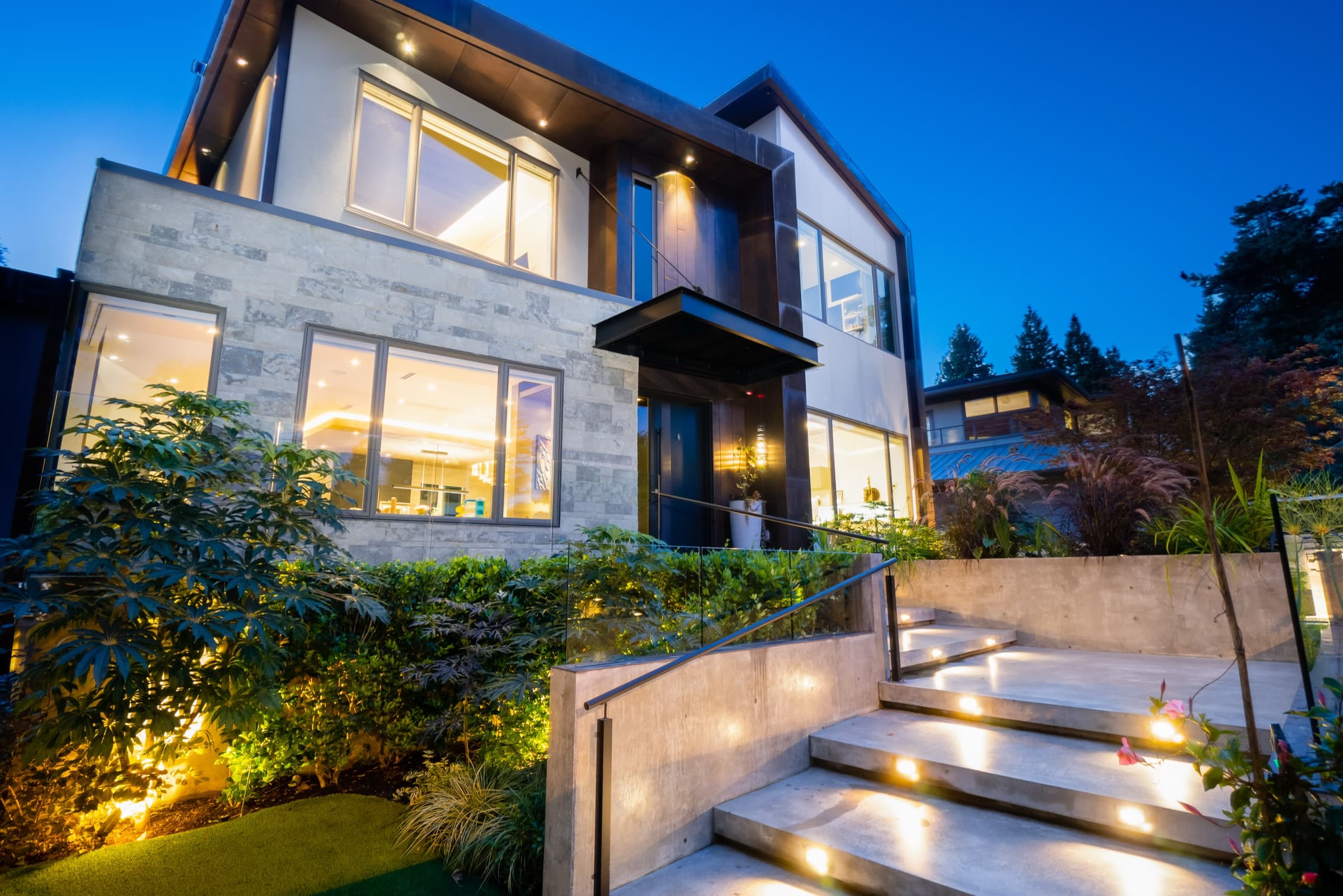 Caliker Homes custom residence at dusk